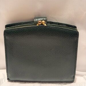 Vintage Coach Madison leather wallet in forest green with a kisslock coin purse.